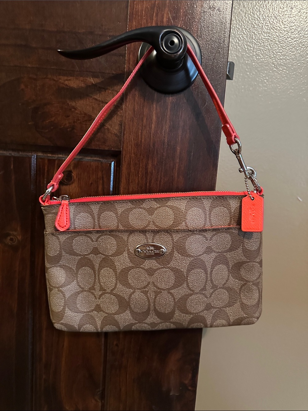 Coach Brown Signature Canvas Wristlet with Red Trim